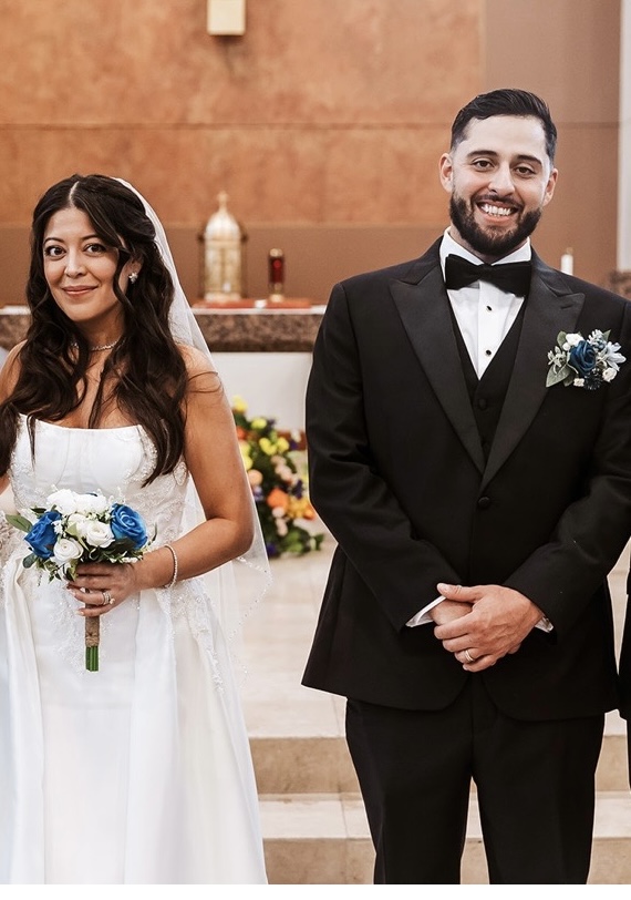 Wedding couple portrait at altar